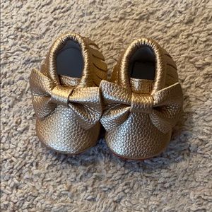 Gold baby moccasins